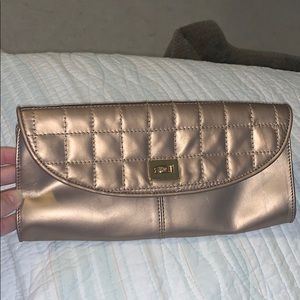 Gold Etienne Aigner clutch purse